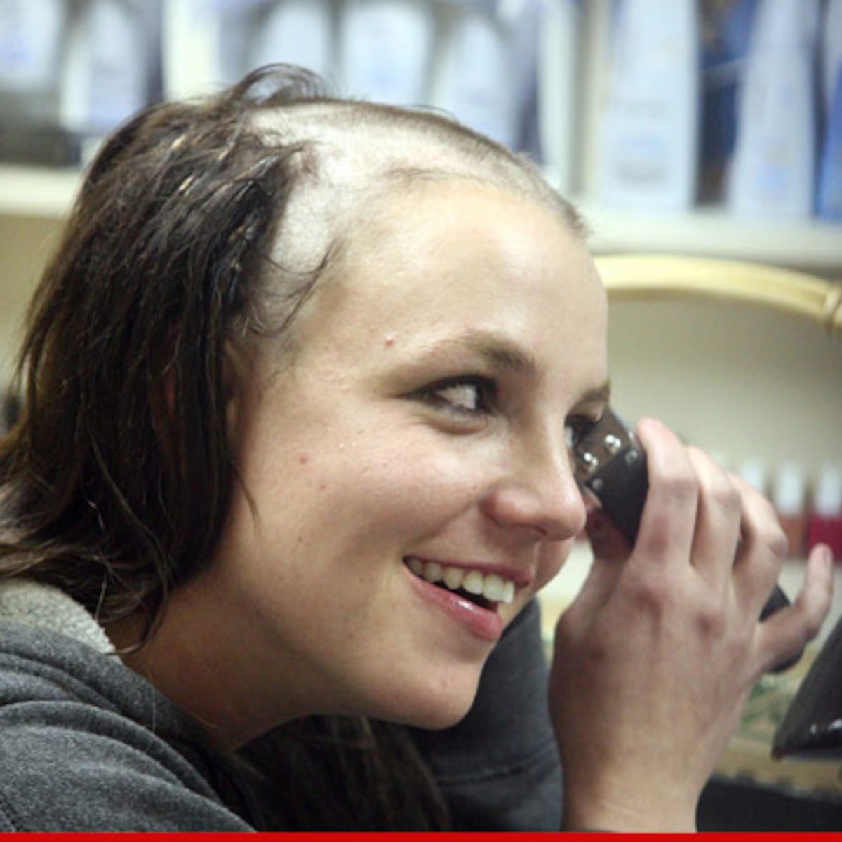 Britney shaving her head.